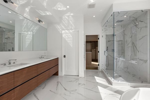 Bathroom, Dual Sink Vanities, Glass Shower, Interior, Marble, Marble Walls, Recessed Lighting, Walk-in Closets