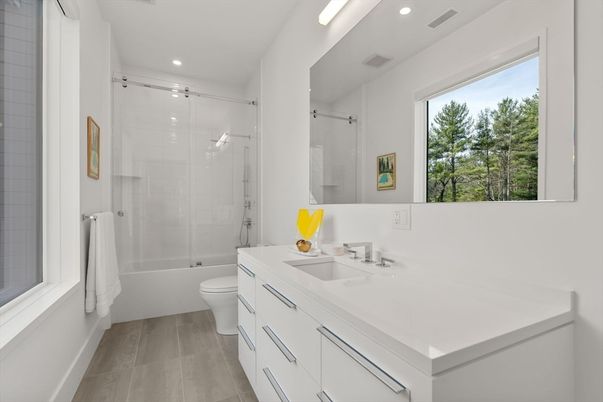 Bathroom, Dual Sink Vanities, Glass Shower, Interior, Recessed Lighting, Wood Texture Flooring