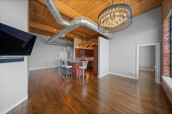 Chandelier, Dining room, Interior, Kitchen, Pendant Lights, Stone Walls, Wooden Ceilings, Wood Texture Flooring