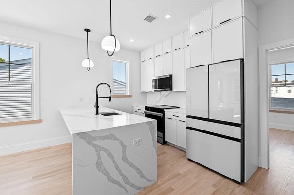 Interior, Kitchen, Marble Walls, Pendant Lights, Recessed Lighting, Wood Texture Flooring