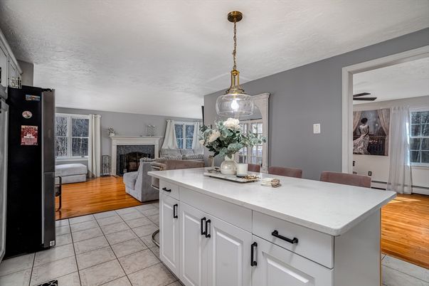 Dining room, Fireplace, Interior, Living room, Pendant Lights, Wood Texture Flooring