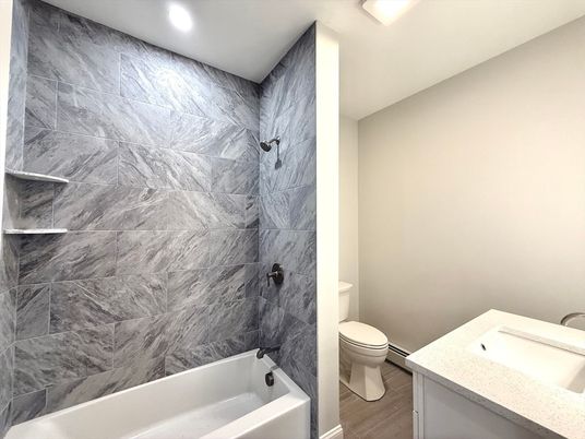 Bathroom, Interior, Marble Walls, Recessed Lighting, Wood Texture Flooring