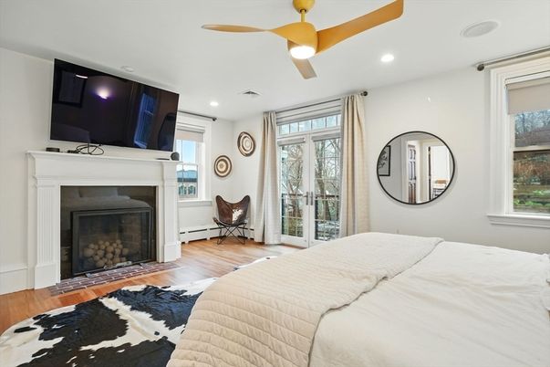 Bedroom, Fireplace, Interior, Recessed Lighting, Wood Texture Flooring