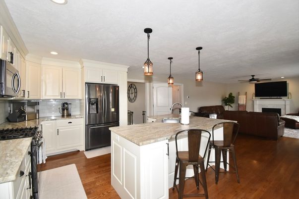 Fireplace, Interior, Kitchen, Pendant Lights, Recessed Lighting, Stainless Steel Appliances, Wood Texture Flooring