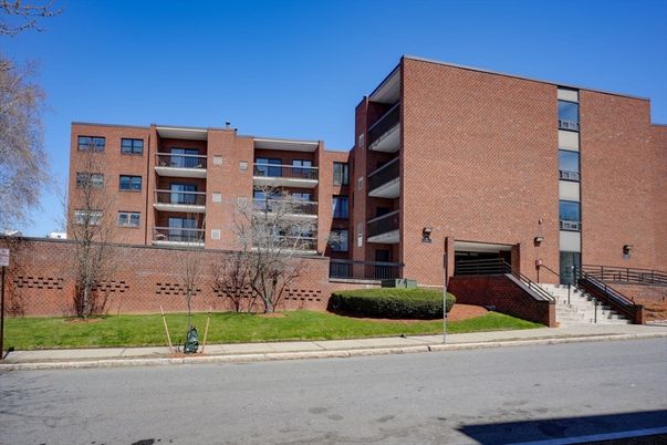 Exterior, Facade, Brick Facade, Condo Building