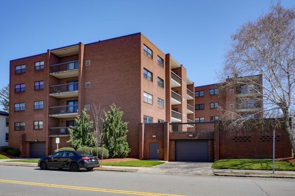 Attached, Exterior, Facade, Brick Facade, Condo Building