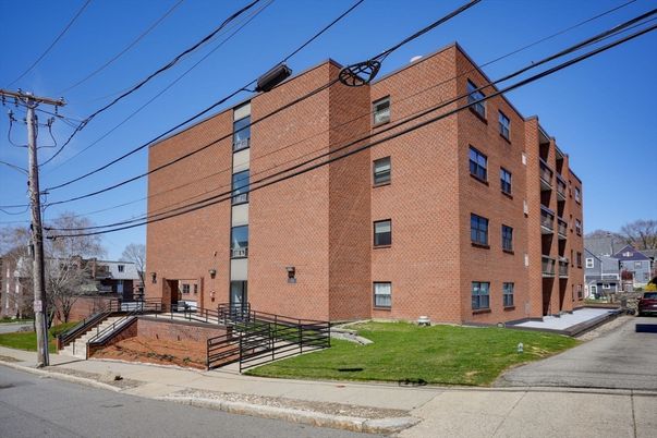 Exterior, Facade, Brick Facade, Condo Building