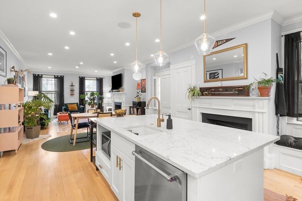 Dining room, Fireplace, Interior, Kitchen, Living room, Pendant Lights, Recessed Lighting, Stainless Steel Appliances, Wood Texture Flooring