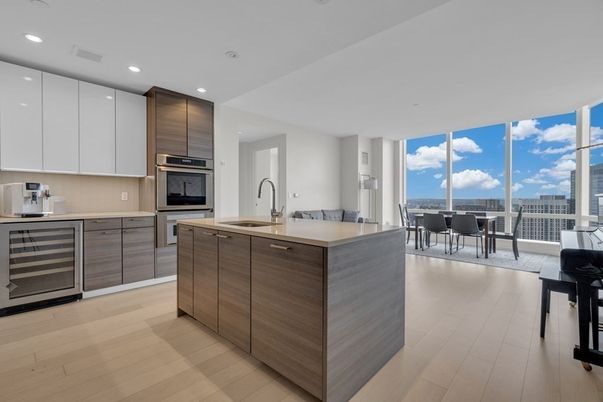 Dining room, Interior, Kitchen, Recessed Lighting, Stainless Steel Appliances, Wood Texture Flooring