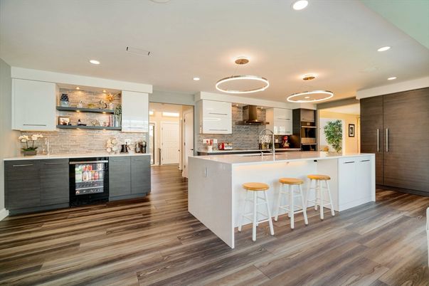 Interior, Kitchen, Pendant Lights, Recessed Lighting, Stainless Steel Appliances, Stone Walls, Wood Texture Flooring