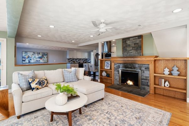 Fireplace, Interior, Kitchen, Living room, Recessed Lighting, Stainless Steel Appliances, Stone Walls, Wood Texture Flooring