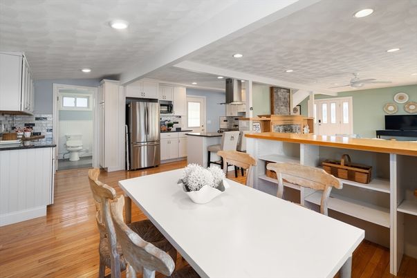 Dining room, Interior, Kitchen, Recessed Lighting, Stainless Steel Appliances, Wood Texture Flooring