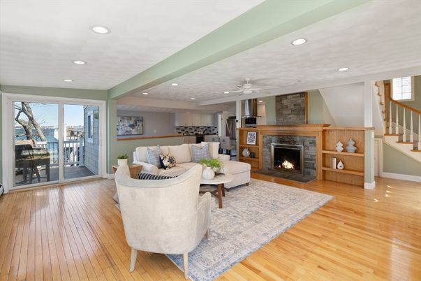 Fireplace, Interior, Living room, Recessed Lighting, Stone Walls, Wood Texture Flooring
