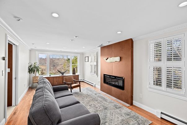 Fireplace, Interior, Living room, Recessed Lighting, Wood Texture Flooring, Wooden Walls