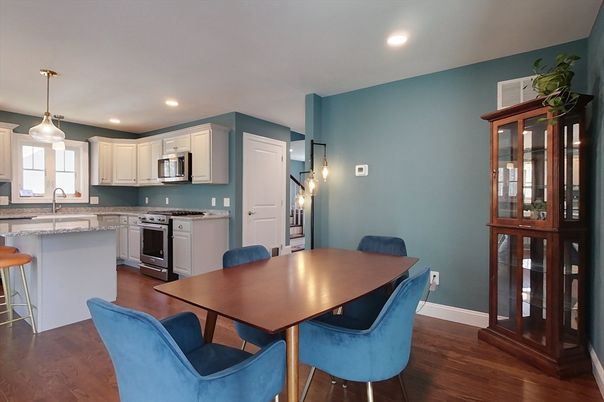 Dining room, Interior, Kitchen, Pendant Lights, Recessed Lighting, Stainless Steel Appliances, Wood Texture Flooring