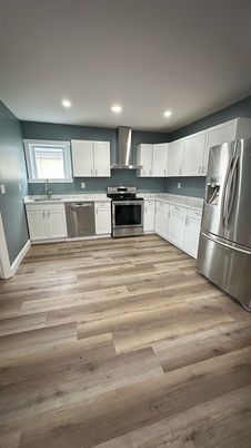 Interior, Kitchen, Recessed Lighting, Stainless Steel Appliances, Wood Texture Flooring