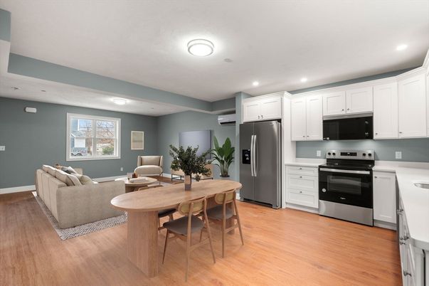 Dining room, Interior, Kitchen, Living room, Recessed Lighting, Stainless Steel Appliances, Wood Texture Flooring
