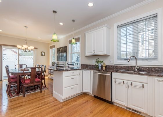 Chandelier, Dining room, Interior, Kitchen, Pendant Lights, Recessed Lighting, Stainless Steel Appliances, Wood Texture Flooring
