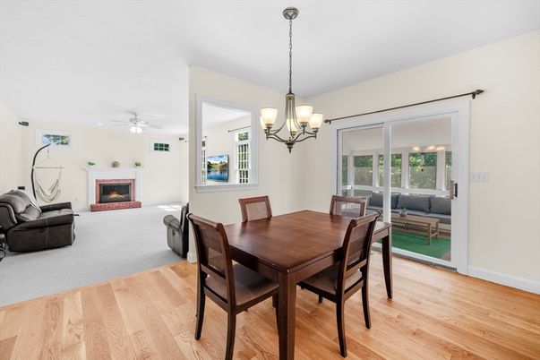 Chandelier, Dining room, Fireplace, Interior, Living room, Wood Texture Flooring