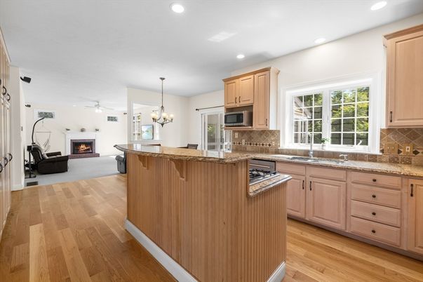 Chandelier, Fireplace, Interior, Kitchen, Recessed Lighting, Wood Texture Flooring