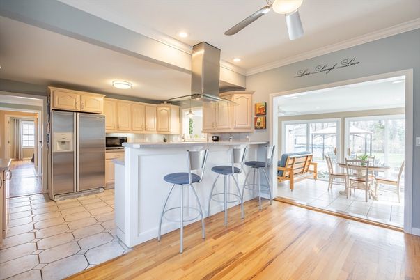 Dining room, Interior, Kitchen, Recessed Lighting, Stainless Steel Appliances, Wood Texture Flooring