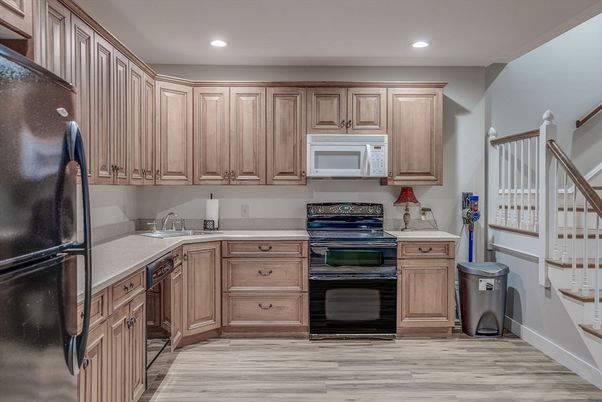 Interior, Kitchen, Recessed Lighting, Washer, Wood Texture Flooring