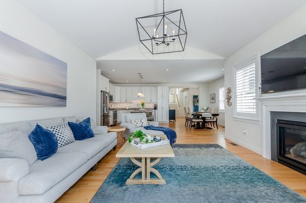 Dining room, Fireplace, Interior, Kitchen, Living room, Pendant Lights, Recessed Lighting, Stainless Steel Appliances, Wood Texture Flooring