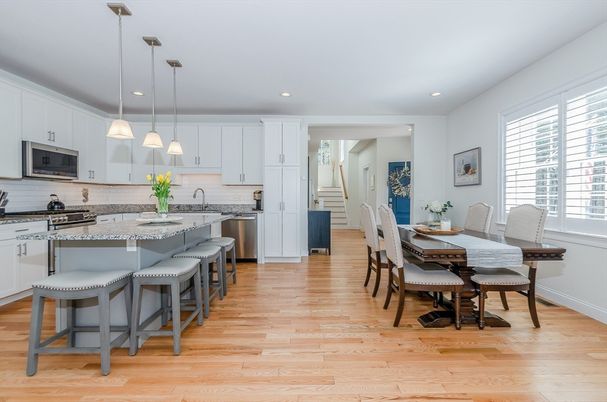 Dining room, Interior, Kitchen, Pendant Lights, Recessed Lighting, Stainless Steel Appliances, Wood Texture Flooring