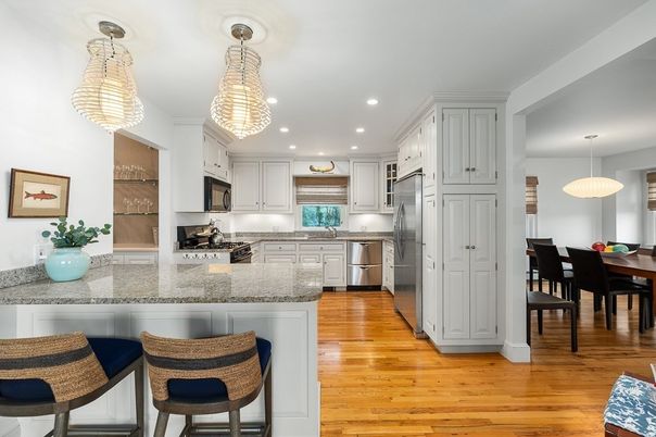 Dining room, Interior, Kitchen, Pendant Lights, Recessed Lighting, Stainless Steel Appliances, Wood Texture Flooring