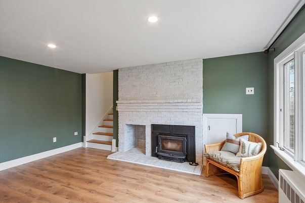Fireplace, Interior, Recessed Lighting, Stone Walls, Wood Texture Flooring