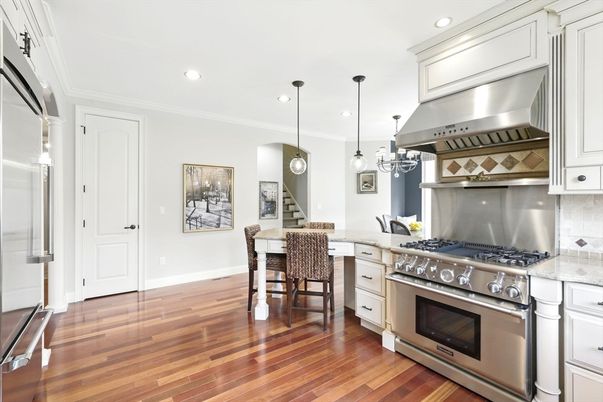 Dining room, Interior, Kitchen, Pendant Lights, Recessed Lighting, Stainless Steel Appliances, Wood Texture Flooring