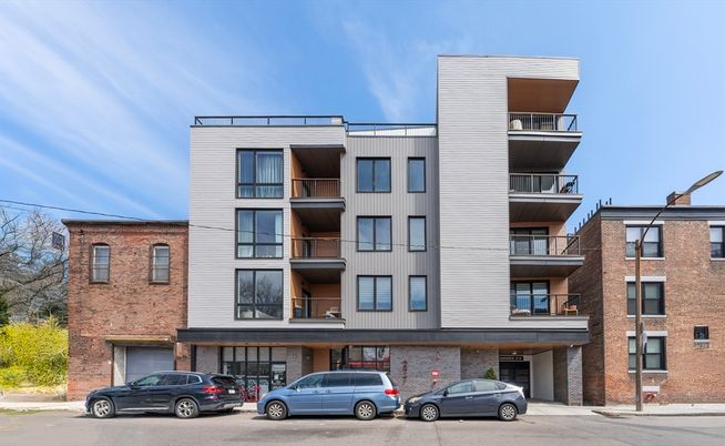 Exterior, Facade, Brick Facade, Condo Building