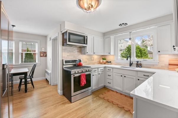 Dining room, Interior, Kitchen, Pendant Lights, Stainless Steel Appliances, Wood Texture Flooring