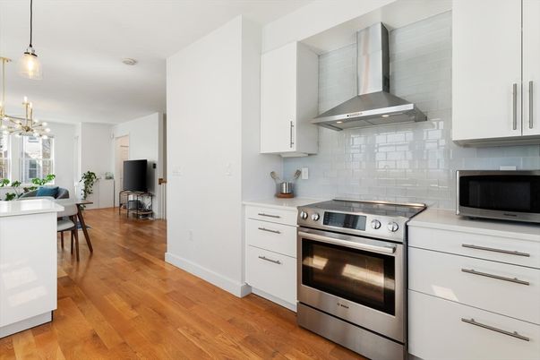 Dining room, Interior, Kitchen, Pendant Lights, Stainless Steel Appliances, Wood Texture Flooring