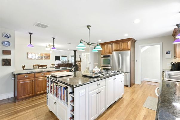 Dining room, Interior, Kitchen, Pendant Lights, Recessed Lighting, Stainless Steel Appliances, Wood Texture Flooring