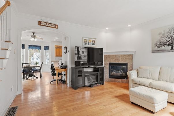 Dining room, Fireplace, Interior, Living room, Recessed Lighting, Wood Texture Flooring