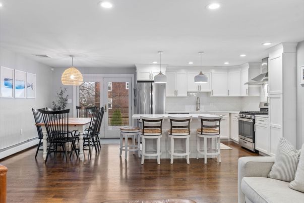 Dining room, Interior, Kitchen, Pendant Lights, Recessed Lighting, Stainless Steel Appliances, Wood Texture Flooring