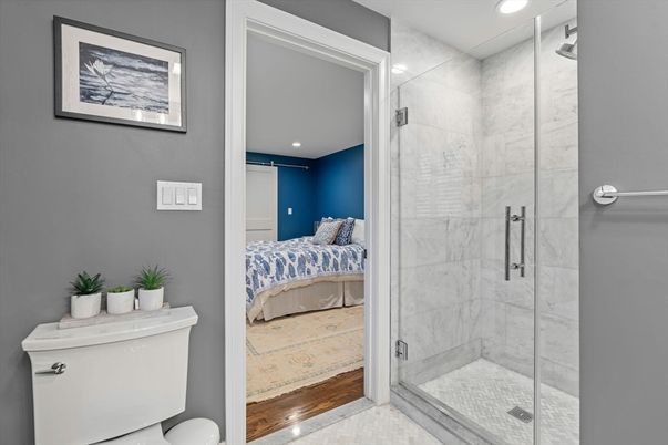 Bathroom, Bedroom, Glass Shower, Interior, Marble Walls, Recessed Lighting, Wood Texture Flooring