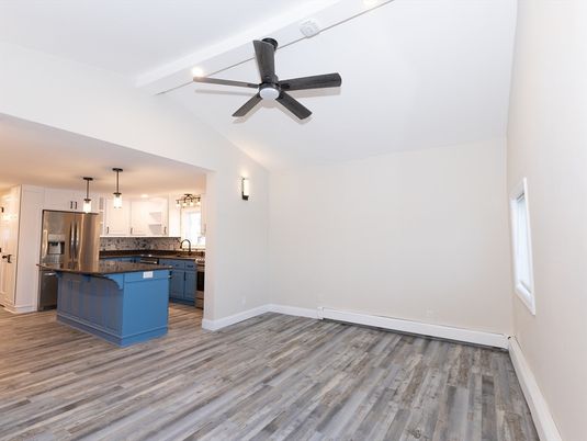 Empty room, Interior, Kitchen, Pendant Lights, Stainless Steel Appliances, Wood Texture Flooring
