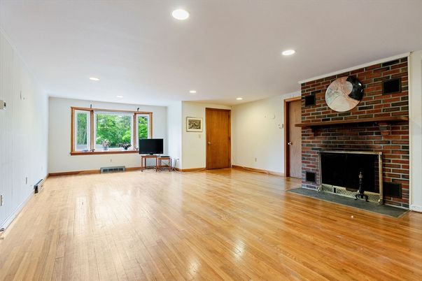 Dining room, Fireplace, Interior, Living room, Recessed Lighting, Wood Texture Flooring