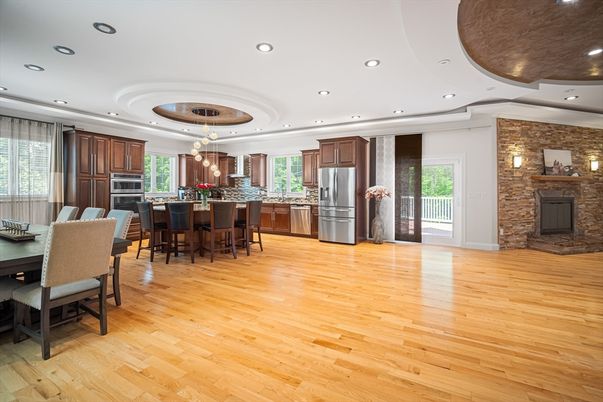 Dining room, Interior, Kitchen, Pendant Lights, Recessed Lighting, Stainless Steel Appliances, Stone Walls, Wood Texture Flooring