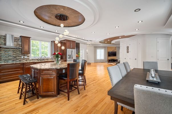 Dining room, Interior, Kitchen, Pendant Lights, Recessed Lighting, Stainless Steel Appliances, Wood Texture Flooring