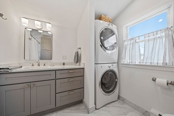 Bathroom, Dual Sink Vanities, Interior, Marble, Utility Closets, Washer