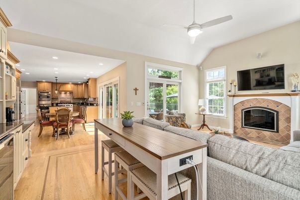 Dining room, Fireplace, Interior, Kitchen, Living room, Recessed Lighting, Stainless Steel Appliances, Wood Texture Flooring