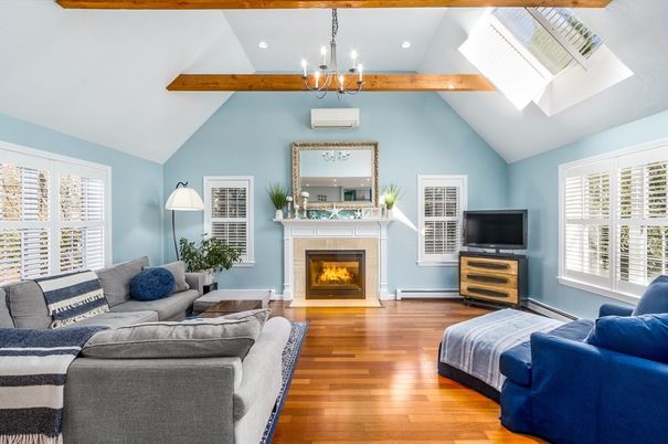 Chandelier, Fireplace, Interior, Living room, Pendant Lights, Recessed Lighting, Wooden Beams, Wood Texture Flooring