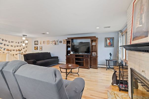 Fireplace, Interior, Living room, Recessed Lighting, Wood Texture Flooring