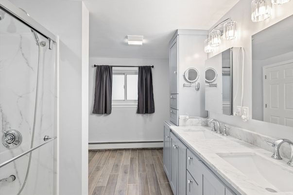 Bathroom, Dual Sink Vanities, Interior, Marble Walls, Wood Texture Flooring