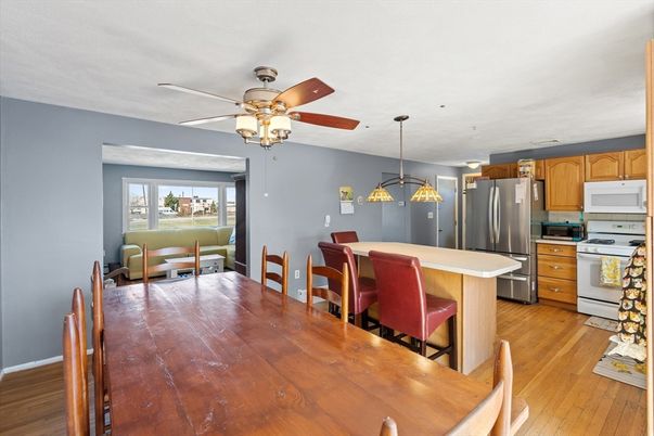 Dining room, Interior, Kitchen, Pendant Lights, Stainless Steel Appliances, Wood Texture Flooring