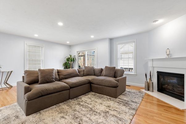 Fireplace, Interior, Living room, Recessed Lighting, Wood Texture Flooring