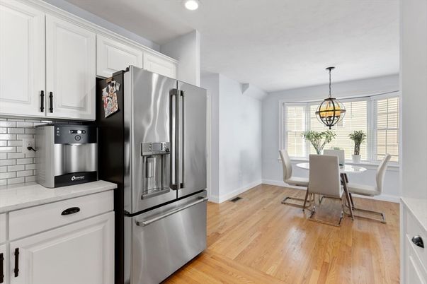 Chandelier, Dining room, Interior, Kitchen, Pendant Lights, Recessed Lighting, Stainless Steel Appliances, Wood Texture Flooring